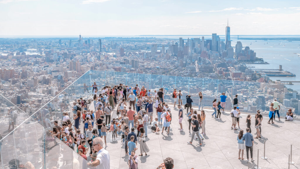 Group of people at the Edge enjoying a view of NYC, one of the best things to do in Chelsea NYC