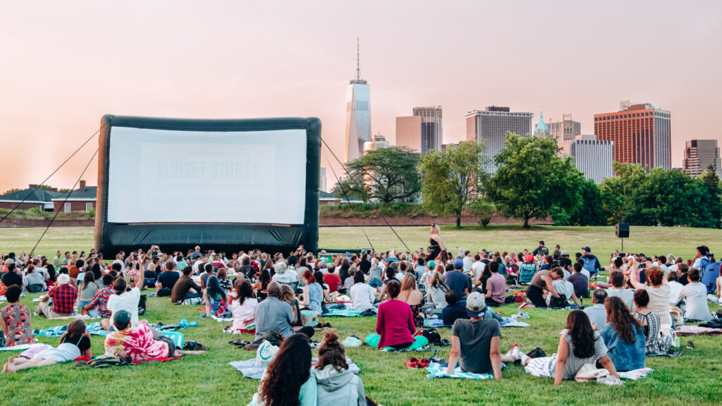 People watching a movie for free, which is one of the best free things to do in New York City
