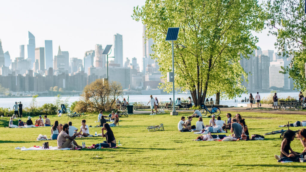 People relaxing at the Marsha P. Johnson State Park, one of the best parks in New York City