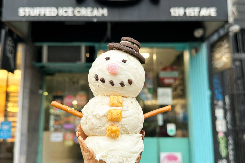 Gelato in front of the building of Stuffed Ice Cream, one of the best ice cream shops in NYC