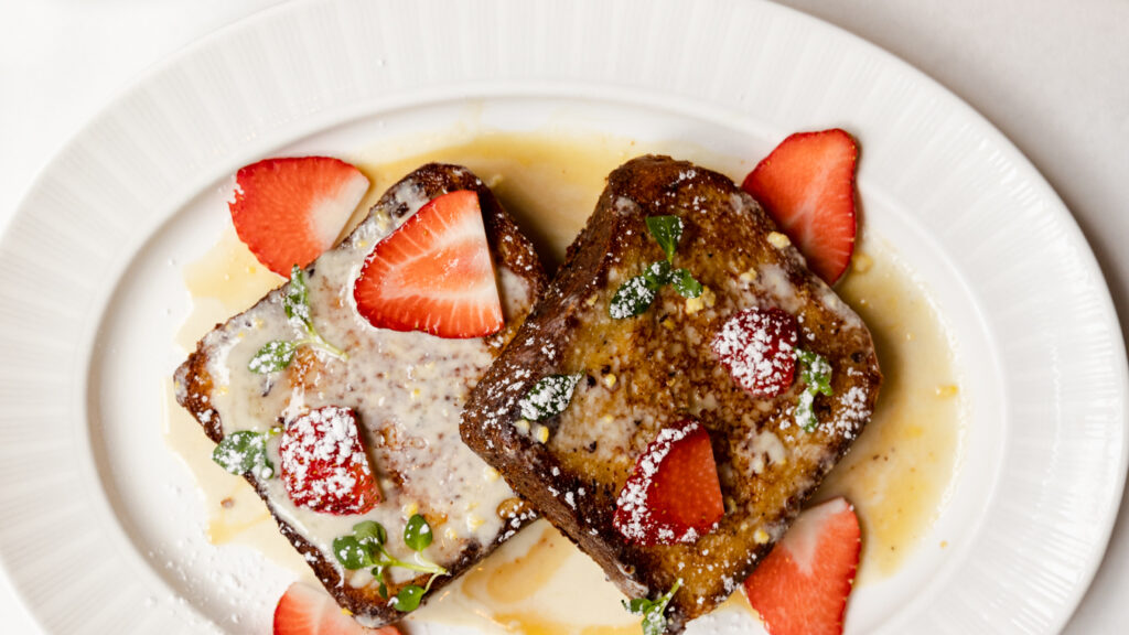 Toast with strawberries at Nice Matin, one of the best breakfast spots on the Upper West Side